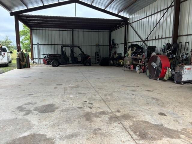 garage featuring a carport