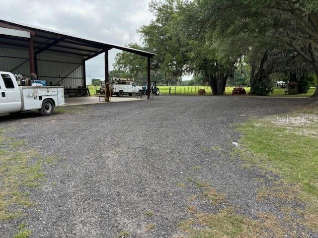 view of parking featuring a carport