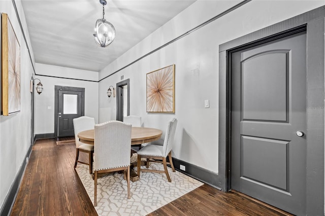 dining room featuring dark wood-type flooring