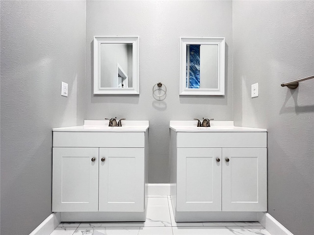 bathroom featuring tile flooring and double sink vanity