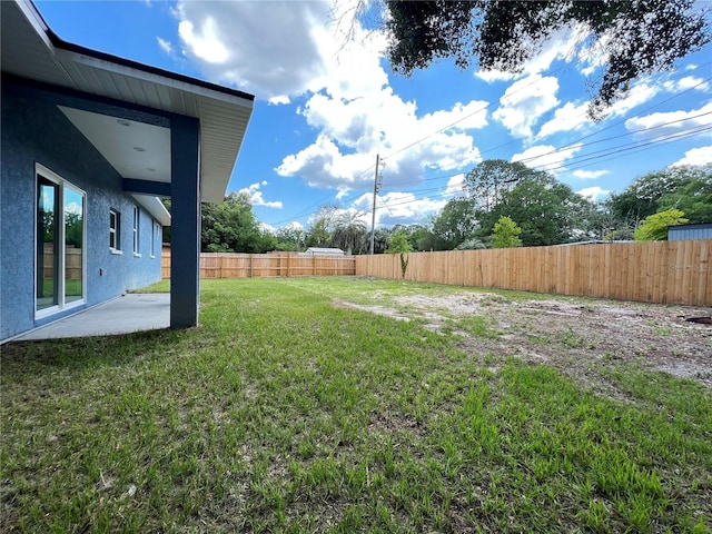 view of yard with a patio area