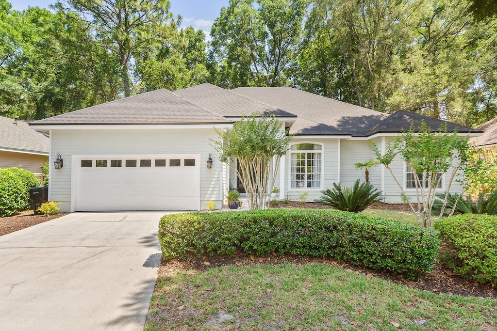 ranch-style home with a garage