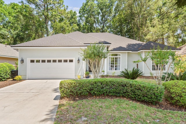 ranch-style home with a garage