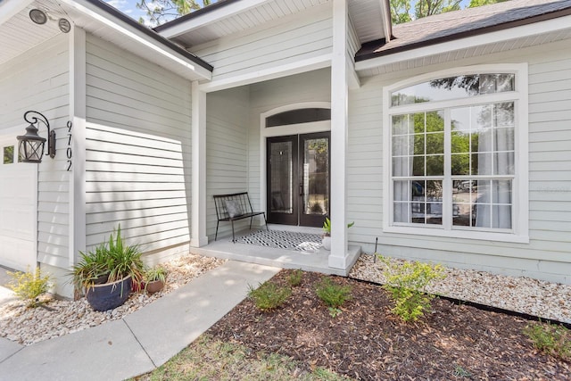 entrance to property with french doors and covered porch