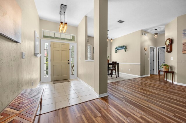 foyer entrance featuring hardwood / wood-style floors