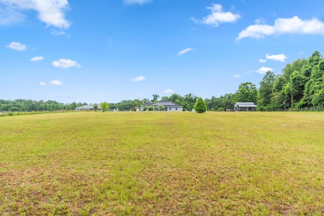 view of yard featuring a rural view