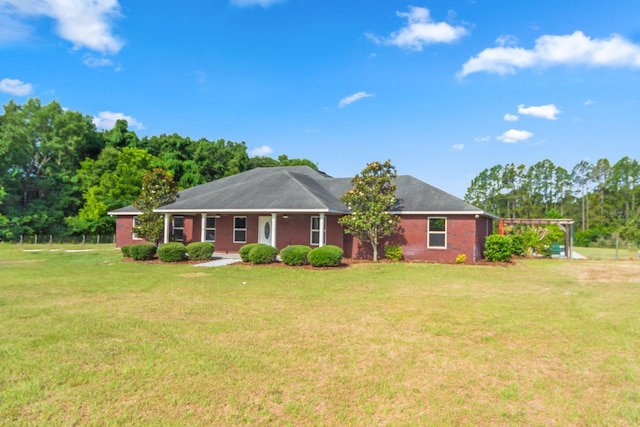 ranch-style house with a front lawn