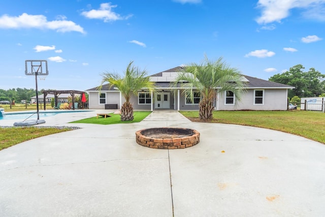 ranch-style home with a pergola, a front yard, and solar panels