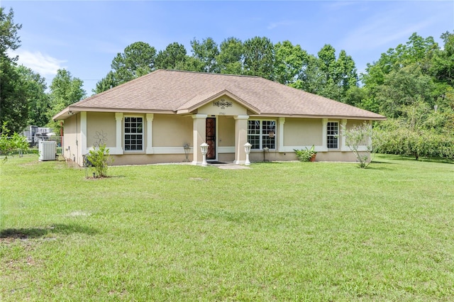 single story home featuring a porch, a front lawn, and central air condition unit