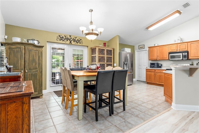 dining room featuring vaulted ceiling, an inviting chandelier, french doors, baseboards, and visible vents