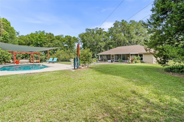 view of yard with a pergola, an outdoor pool, and a patio area