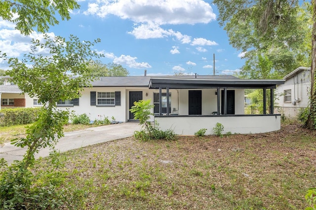 ranch-style house with a porch