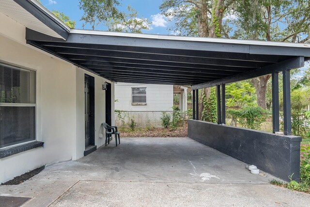 919 SE 19th St, Gainesville, FL 32641 - view of patio featuring a carport