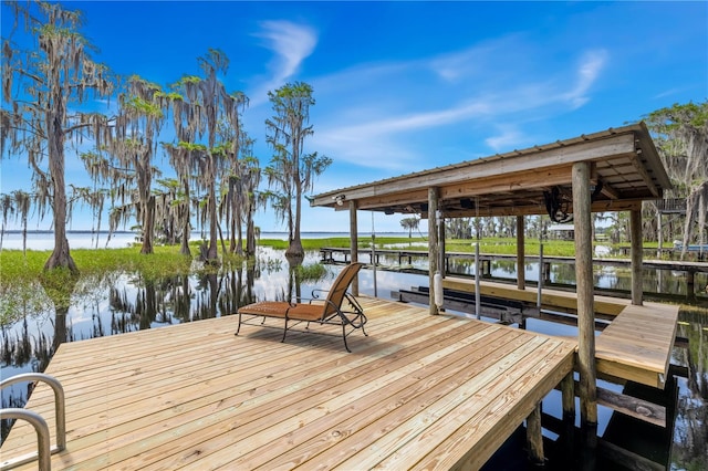 view of dock with a water view