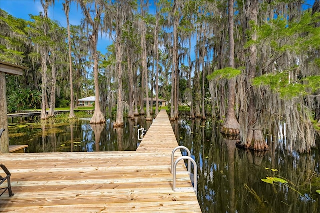 view of dock featuring a water view