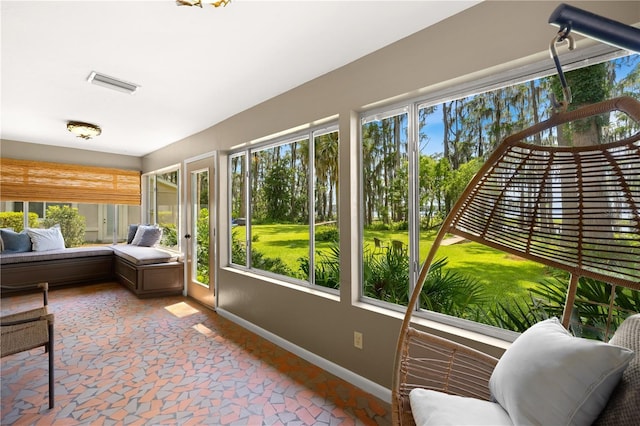 sunroom / solarium with plenty of natural light