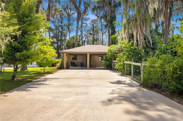 view of front of property with a carport