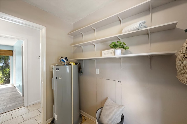 utility room with water heater