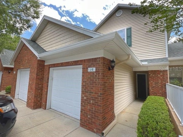 view of home's exterior with a garage