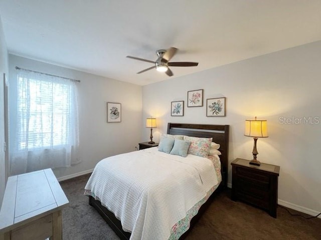 carpeted bedroom featuring ceiling fan