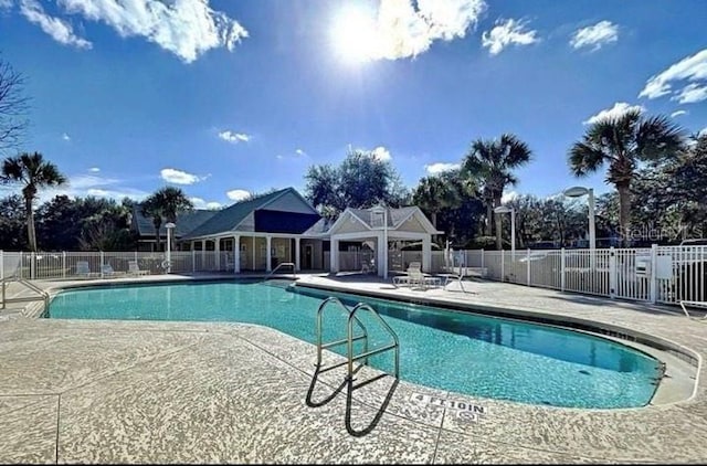 view of pool featuring a patio area