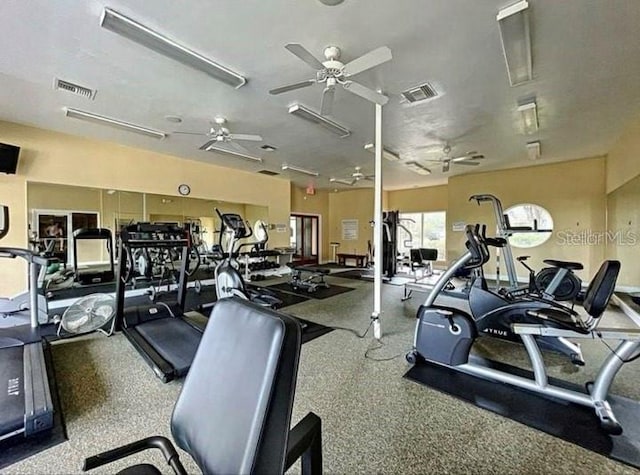 workout area featuring ceiling fan