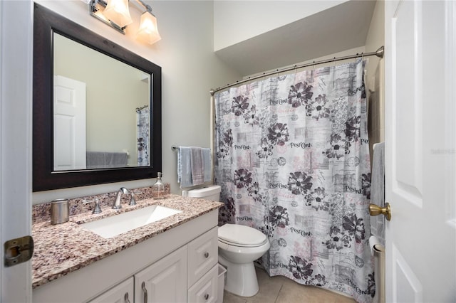 bathroom with tile patterned flooring, vanity, toilet, and a shower with shower curtain