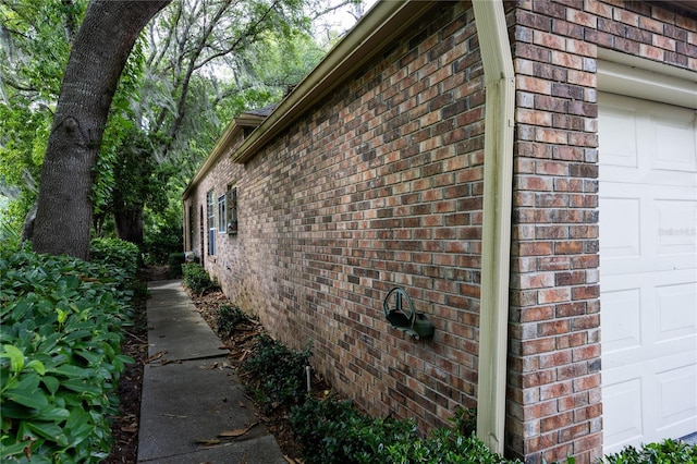 view of side of property featuring a garage