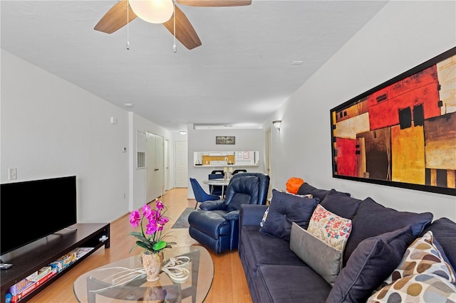 living room with light hardwood / wood-style floors