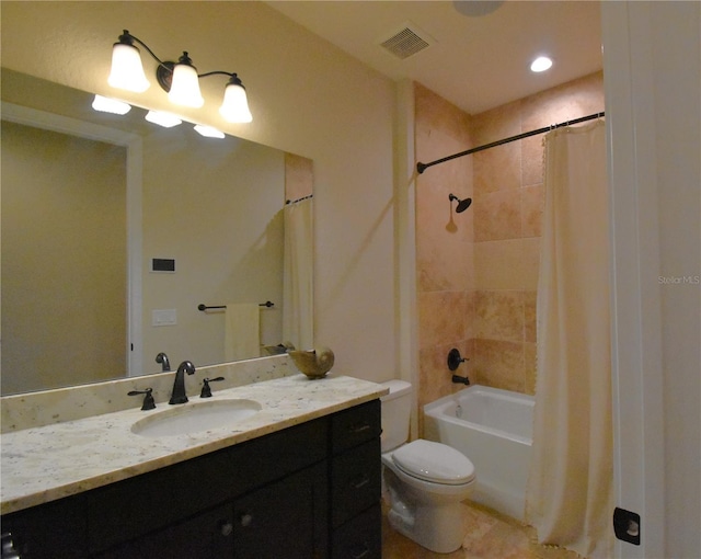 full bathroom featuring vanity, shower / bathtub combination with curtain, and toilet