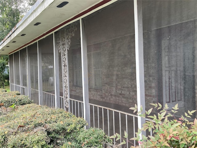 view of home's exterior featuring a sunroom