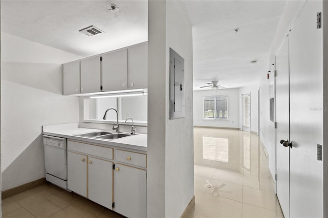 kitchen with white dishwasher, ceiling fan, light tile flooring, and sink