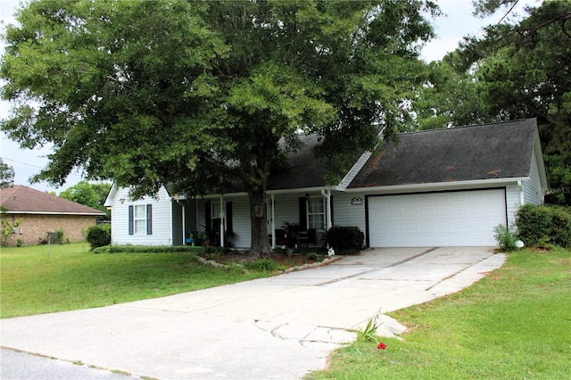 view of front of house with a garage and a front yard