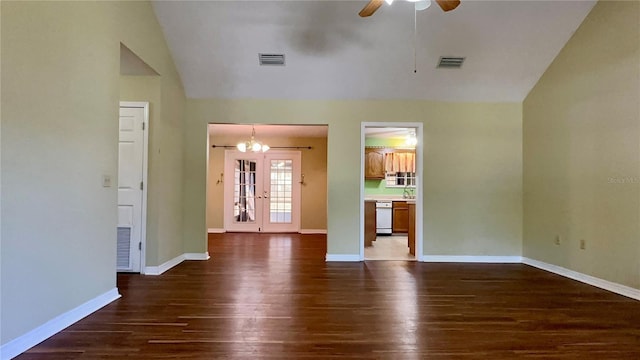 unfurnished living room with vaulted ceiling, dark wood-type flooring, ceiling fan, and french doors