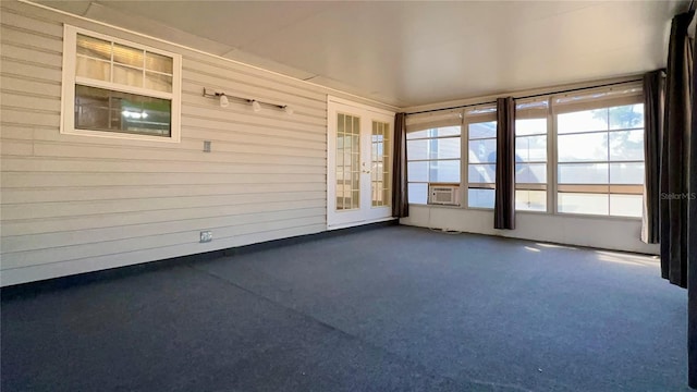 unfurnished sunroom featuring cooling unit