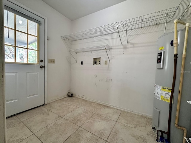 laundry room featuring electric dryer hookup, light tile patterned floors, hookup for a washing machine, and water heater