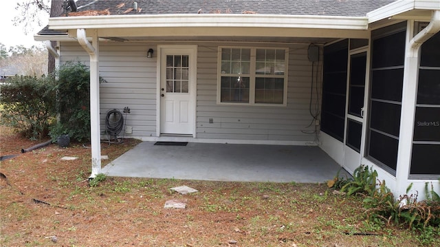 doorway to property with a patio