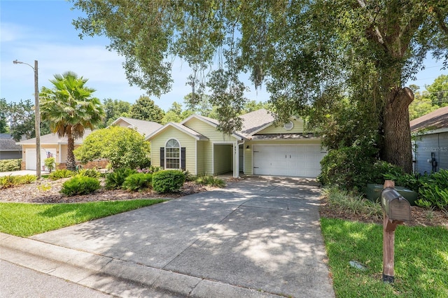 ranch-style home with a garage