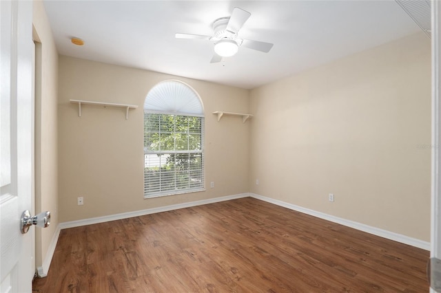 unfurnished room featuring hardwood / wood-style floors and ceiling fan