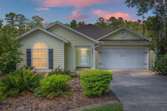 ranch-style home with a garage