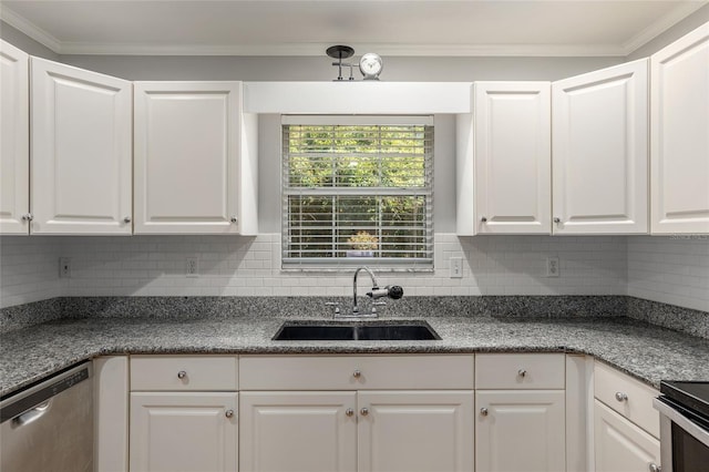 kitchen featuring decorative backsplash, appliances with stainless steel finishes, ornamental molding, sink, and white cabinetry