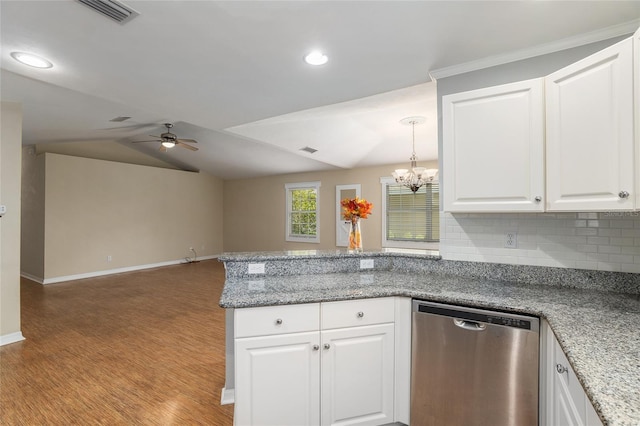 kitchen featuring decorative backsplash, white cabinets, ceiling fan with notable chandelier, dishwasher, and light hardwood / wood-style floors