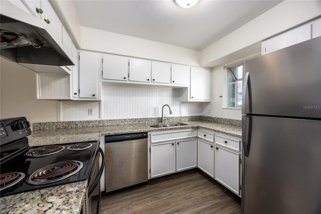 kitchen featuring white cabinets, stainless steel appliances, dark hardwood / wood-style flooring, and sink