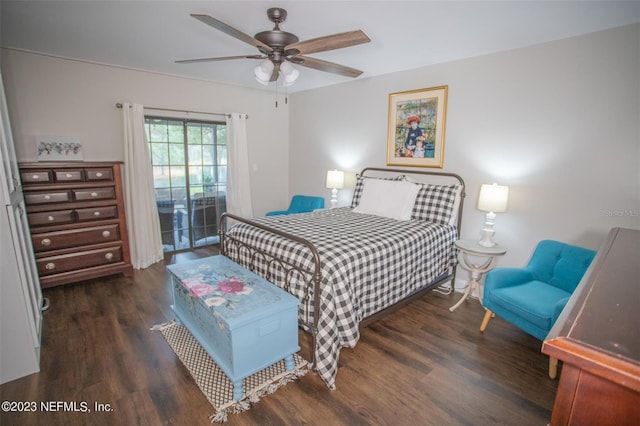 bedroom with ceiling fan, dark hardwood / wood-style flooring, and access to exterior