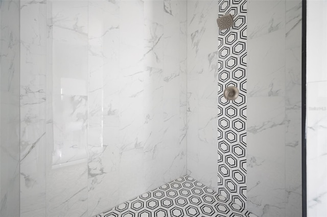 interior space featuring a tile shower