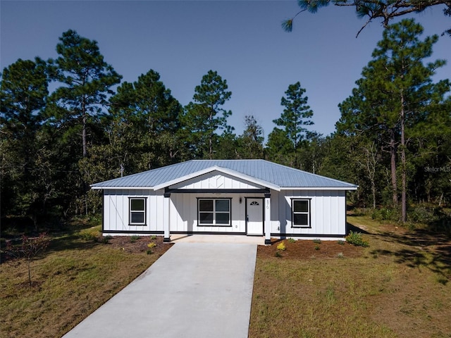 modern farmhouse with a front yard