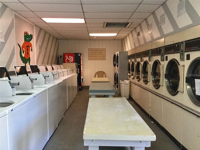 washroom with independent washer and dryer