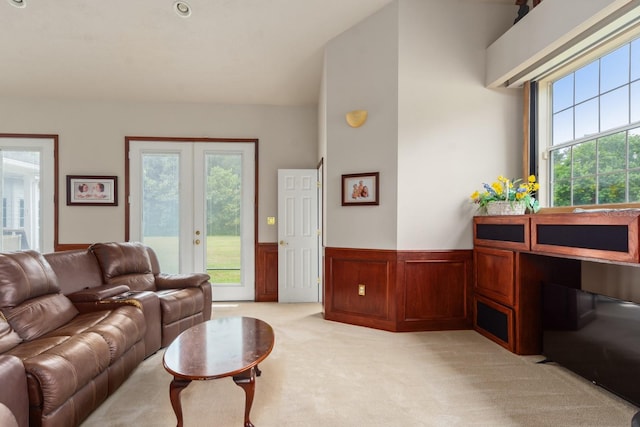 carpeted living room with french doors