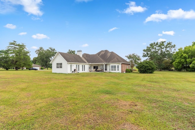 view of front of home with a front yard