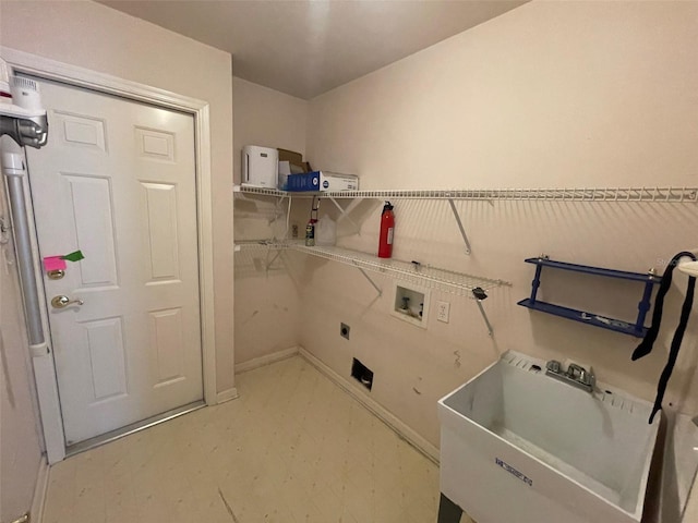 laundry room featuring washer hookup, hookup for an electric dryer, and sink